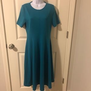 The Paragon teal dress